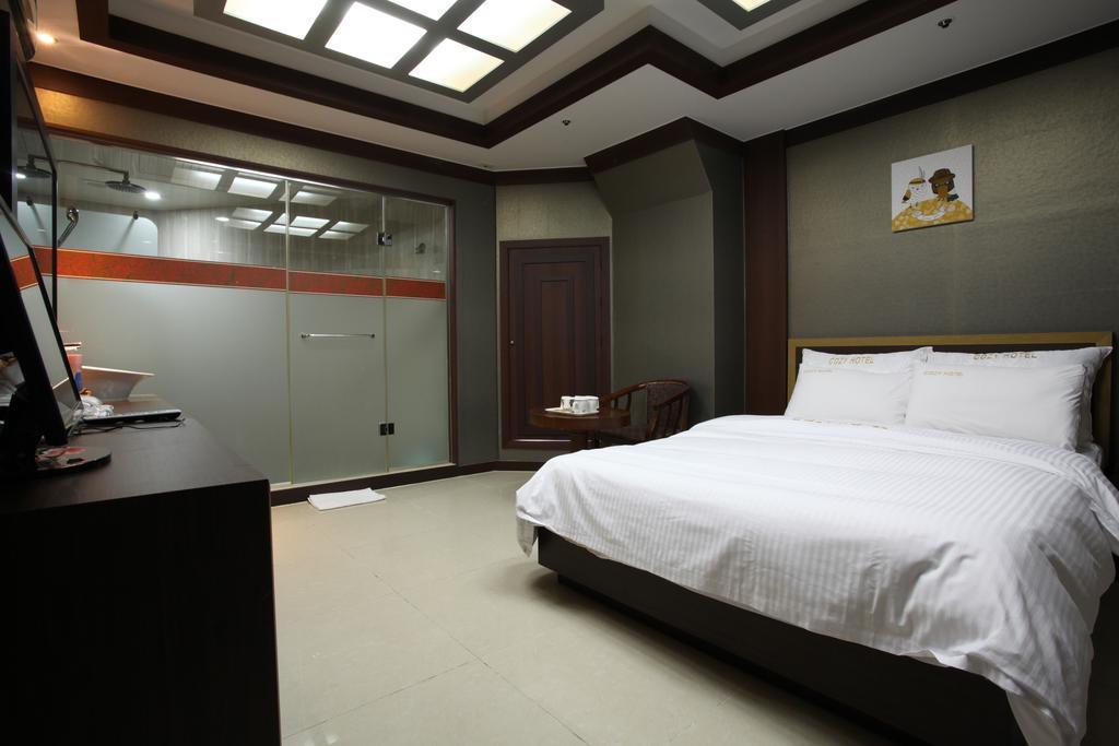 Cozy Hotel Dongtan Habitación foto
