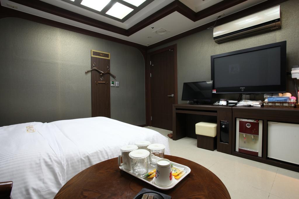 Cozy Hotel Dongtan Habitación foto